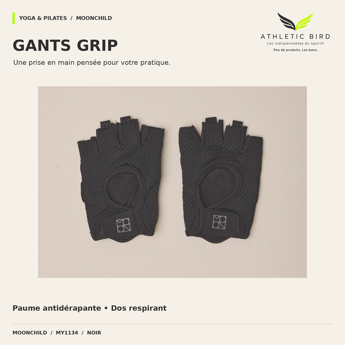 Paire de gants antidérapants Moonchild Grip MY1134 noirs, présentée sur fond sable.