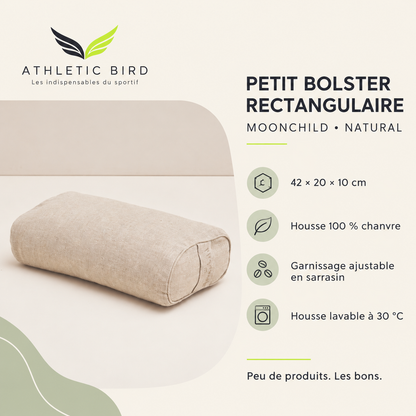 Petit bolster Moonchild Natural : 42 × 20 × 10 cm, housse en chanvre lavable à 30 °C et garnissage ajustable en sarrasin. Logo Athletic Bird en haut à gauche.