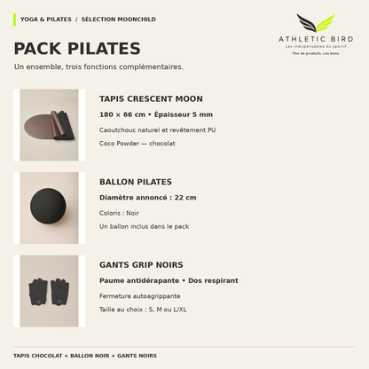 Pack Pilates Moonchild : tapis chocolat de 180 × 66 cm et 5 mm d’épaisseur, ballon noir de 22 cm et gants noirs en tailles S, M ou L/XL.