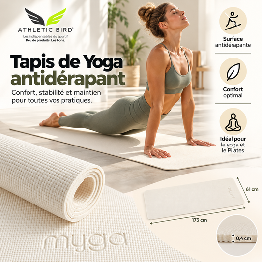 Tapis de yoga Myga crème antidérapant, partiellement déroulé dans un intérieur lumineux.